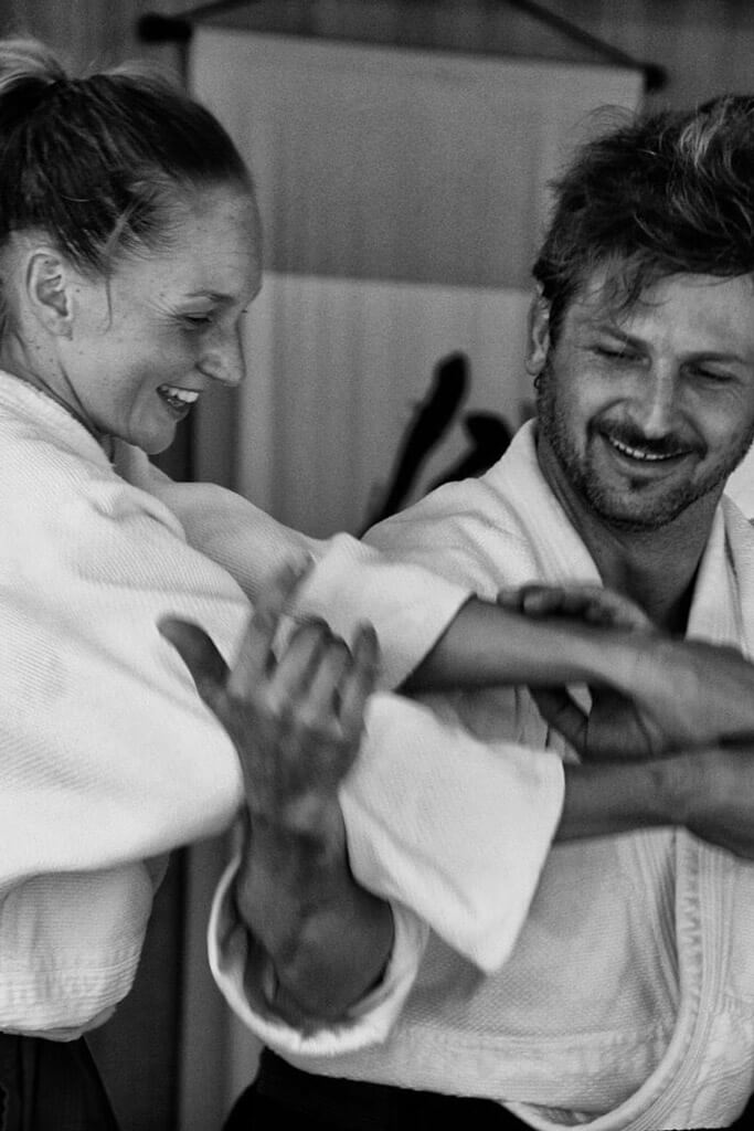Couple practicing aikido