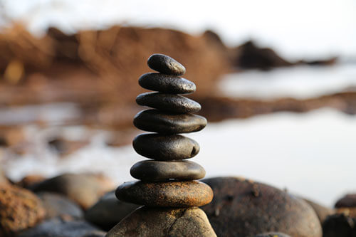 balance on a pile of stones