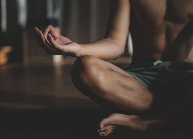 man meditating close up