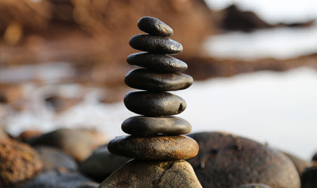 pile of stones aligned on the beach