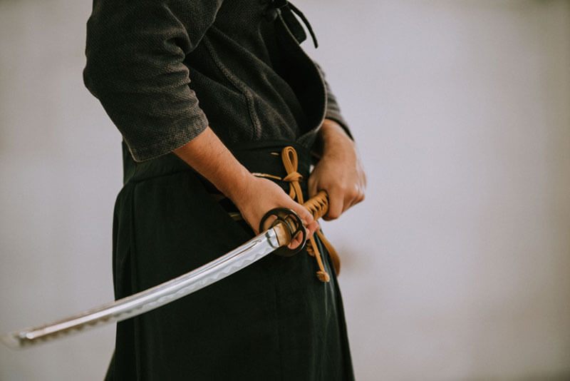 iaido man holding iaito